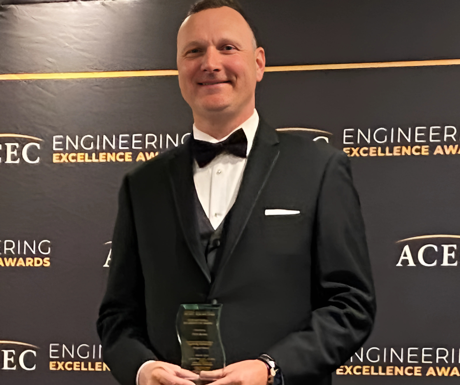 Ted Bennett accepts award
