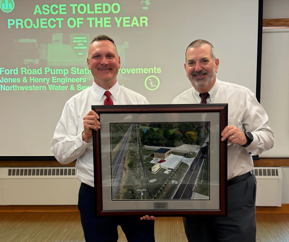 Ted Bennett accepts award